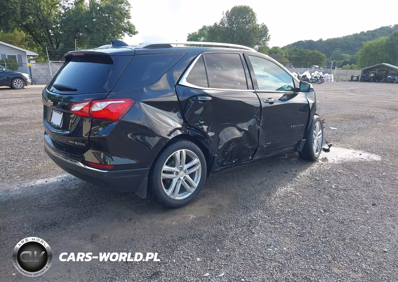 2018 Chevrolet Equinox Premier VIN:2GNAXVEV2J6102529 - 4