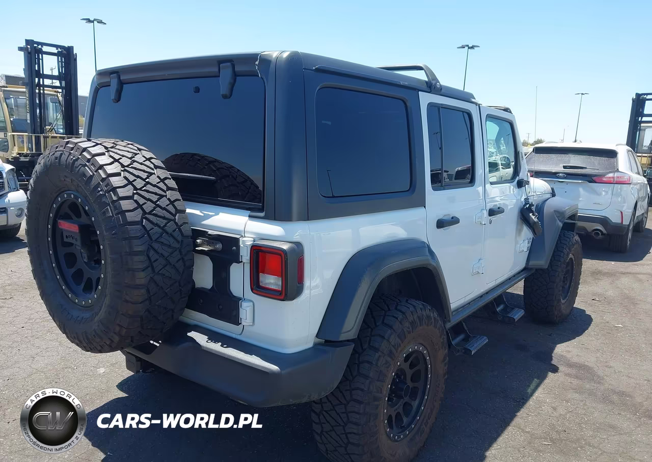 2019 Jeep Wrangler Unlimited Sport S 4X4 VIN:1C4HJXDN1KW670865 - 4
