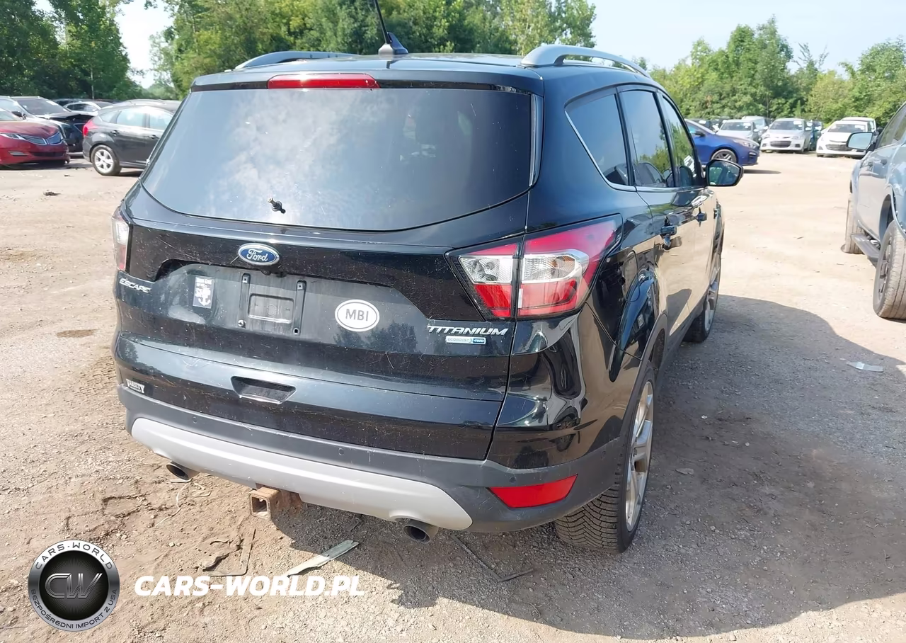 2018 Ford Escape Titanium VIN:1FMCU9J90JUA21603 - 4