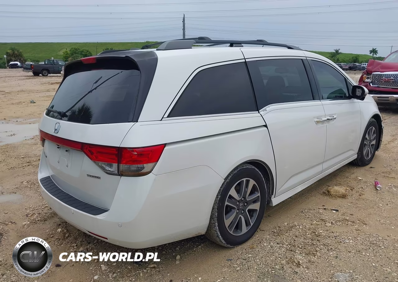 2014 Honda Odyssey Touring-Touring Elite VIN:5FNRL5H93EB125002 - 4