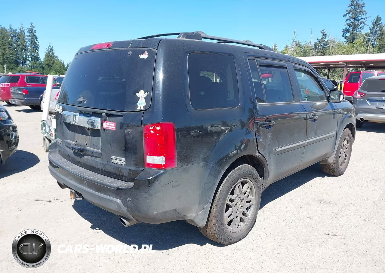 2010 Honda Pilot Touring VIN:5FNYF4H90AB033451 - 4
