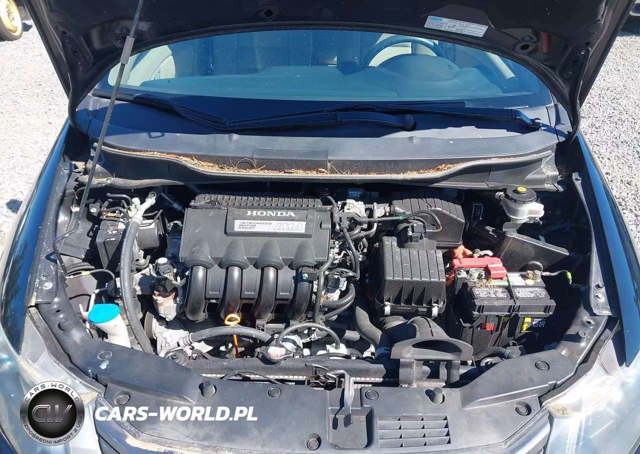 2010 Honda Insight Lx VIN:JHMZE2H52AS000641 - 10