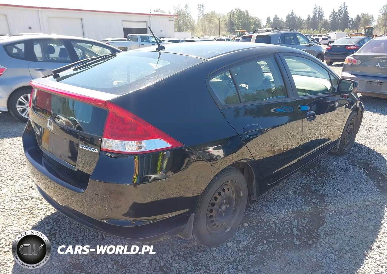 2010 Honda Insight Lx VIN:JHMZE2H52AS000641 - 4