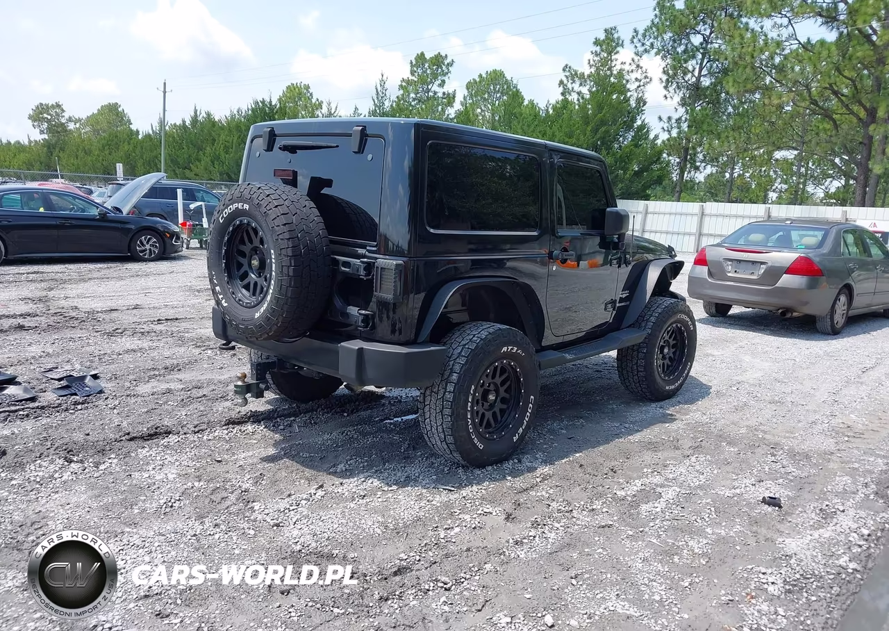2014 Jeep Wrangler Sahara VIN:1C4AJWBG8EL194619 - 4