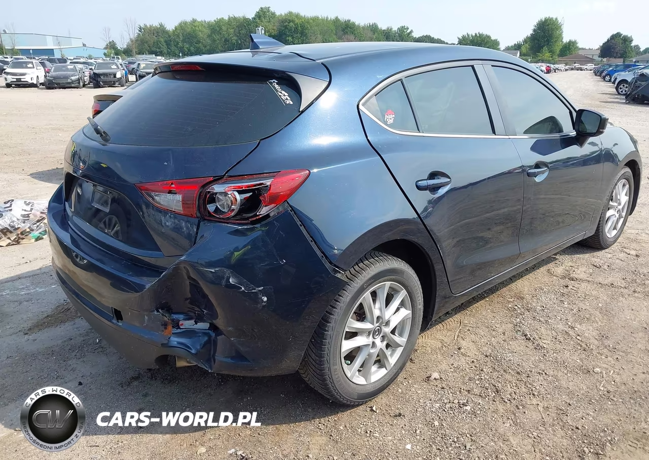 2018 Mazda Mazda3 Grand Touring VIN:3MZBN1M3XJM162640 - 4