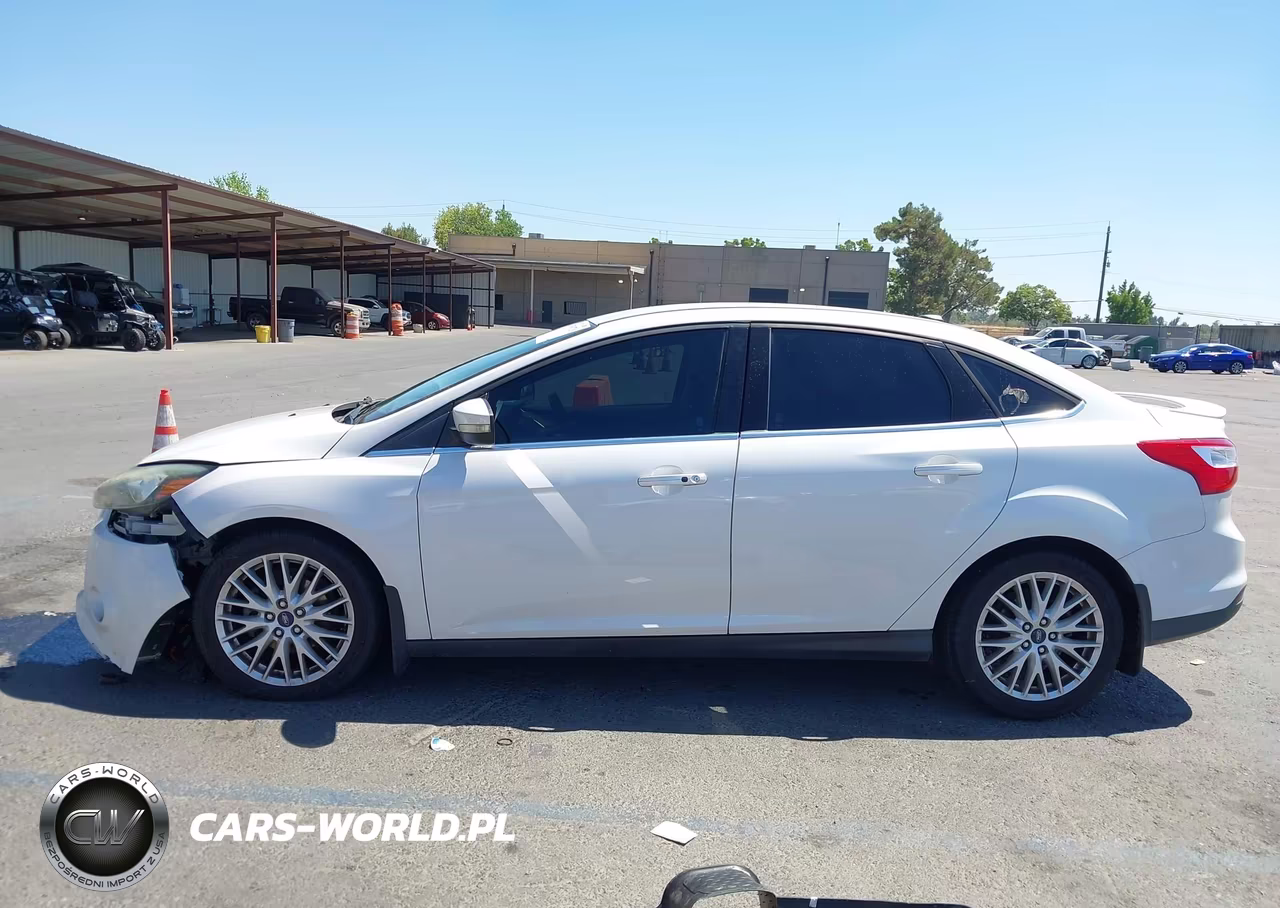 2013 Ford Focus Titanium VIN:1FADP3J27DL382603 - 15