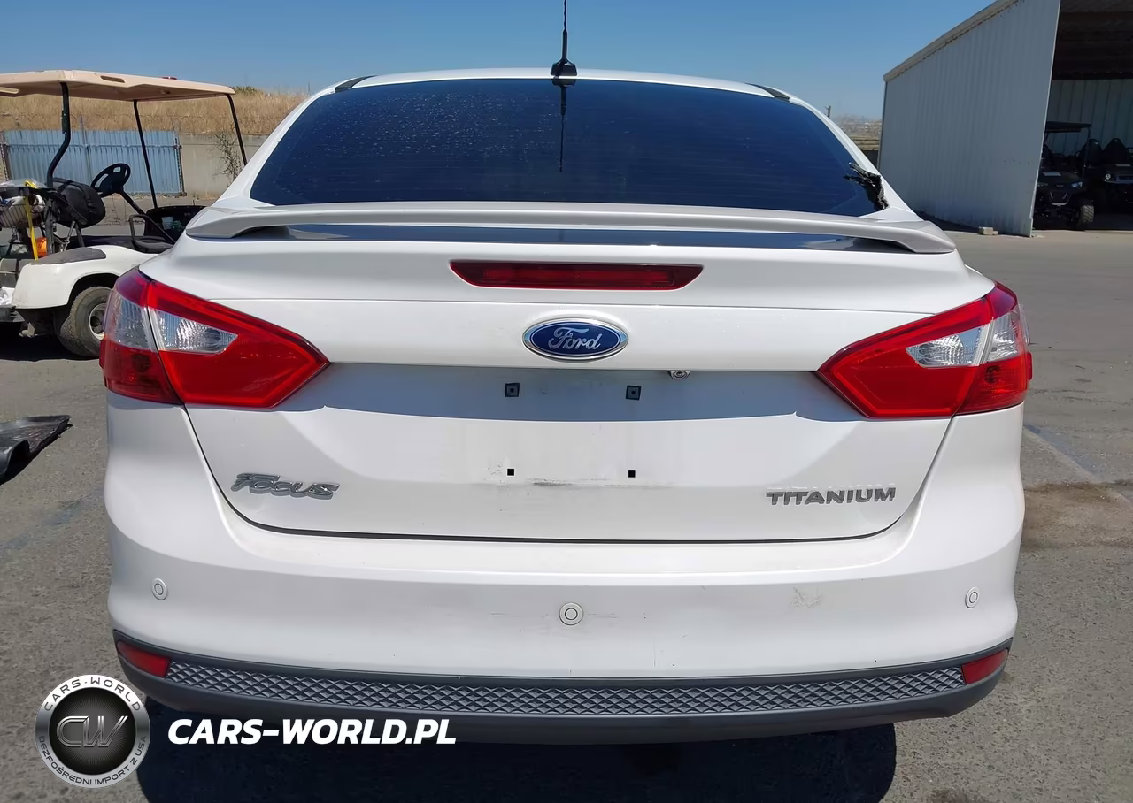 2013 Ford Focus Titanium VIN:1FADP3J27DL382603 - 17