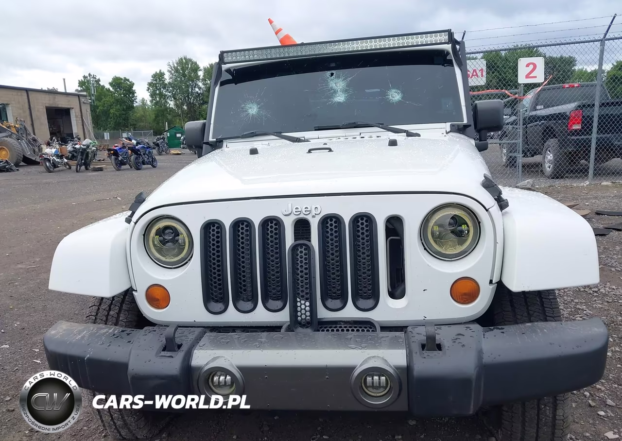 2011 Jeep Wrangler Unlimited Sport VIN:1J4BA3H12BL616928 - 13