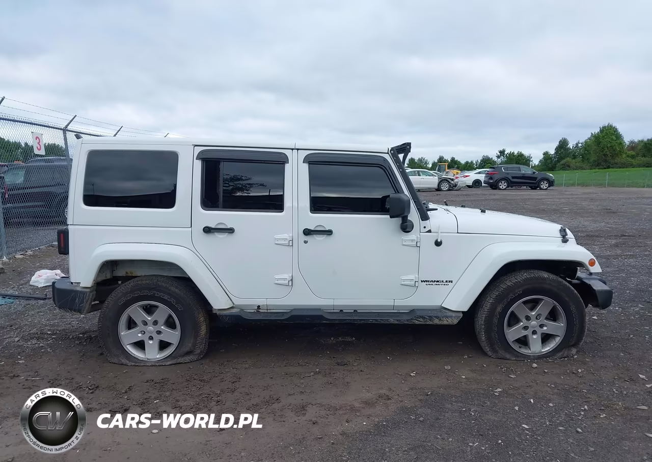 2011 Jeep Wrangler Unlimited Sport VIN:1J4BA3H12BL616928 - 14