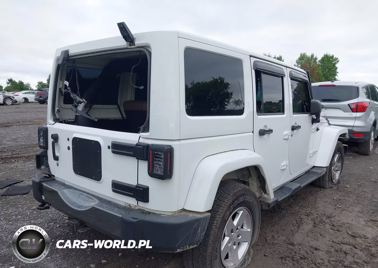 2011 Jeep Wrangler Unlimited Sport VIN:1J4BA3H12BL616928 - 4