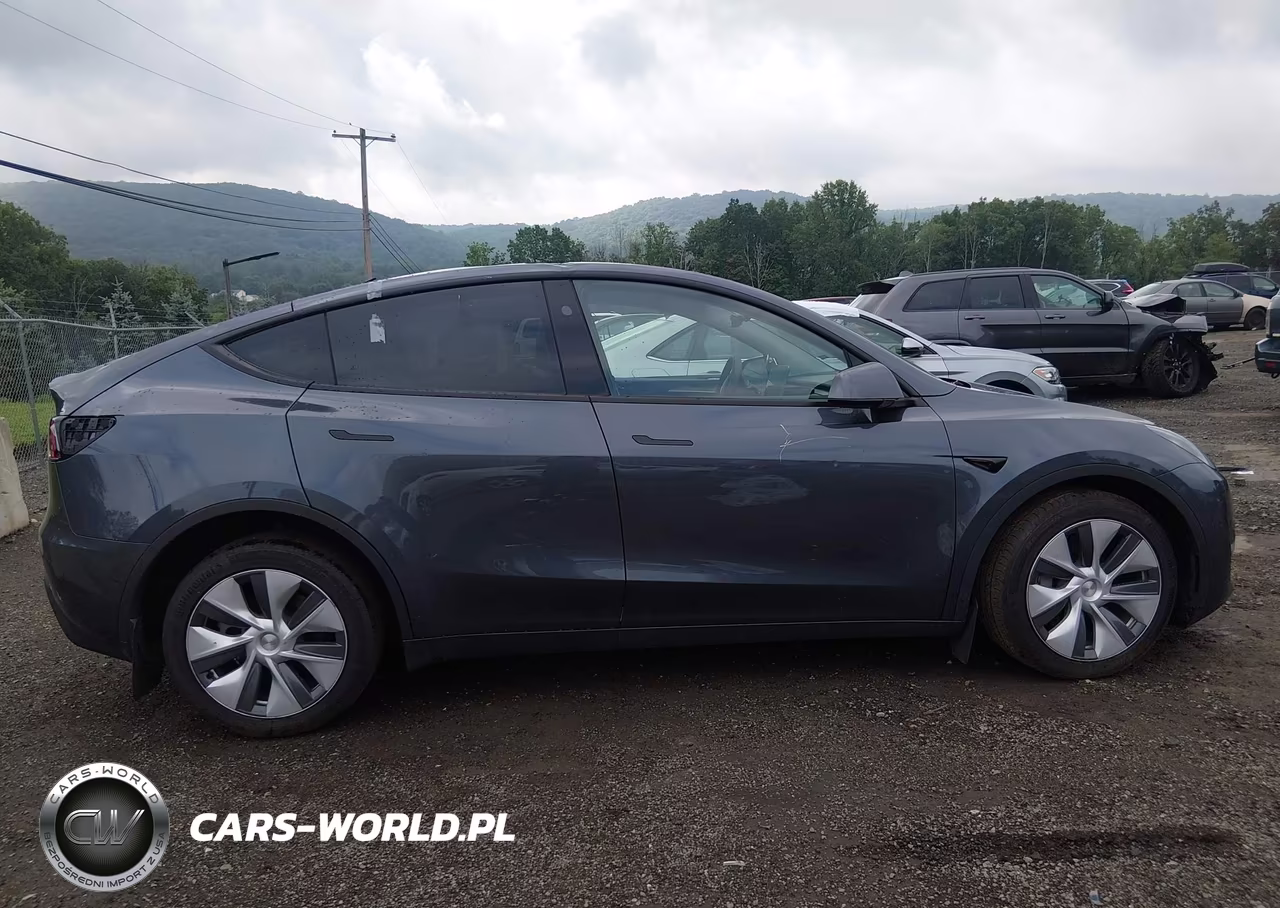 2023 Tesla Model Y VIN:7SAYGDEE9PF855580 - 14
