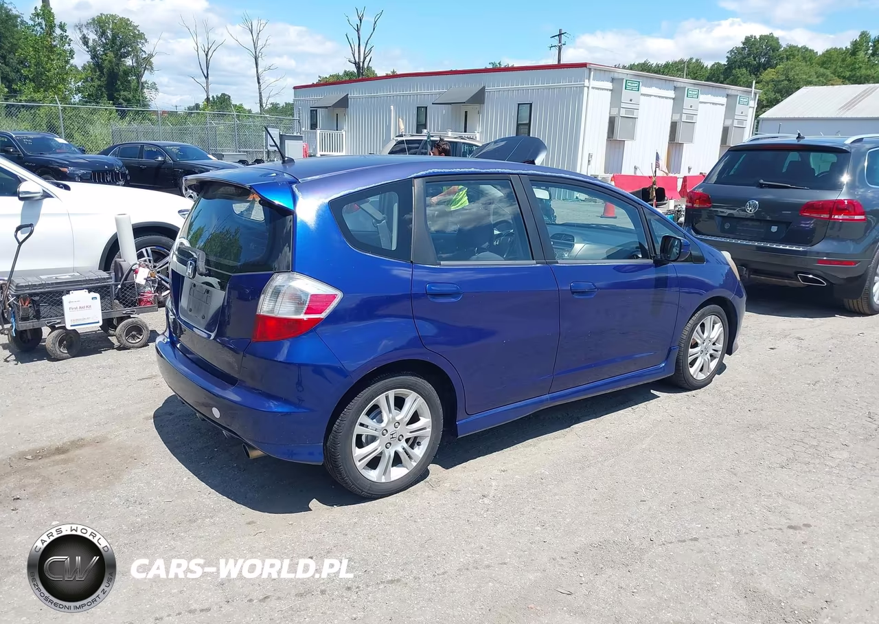 2009 Honda Fit Sport VIN:JHMGE884X9S021282 - 4