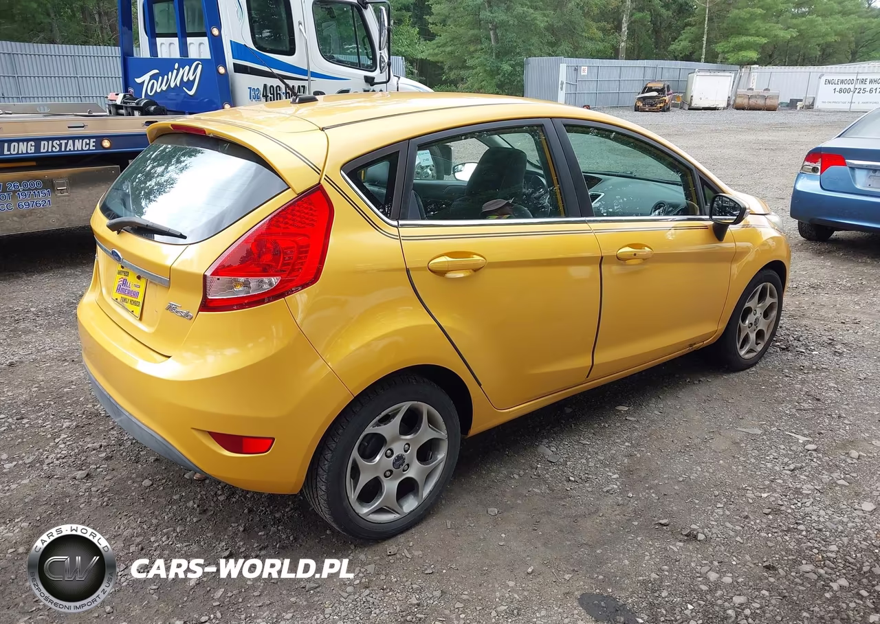 2011 Ford Fiesta Ses VIN:3FADP4FJ0BM113148 - 4