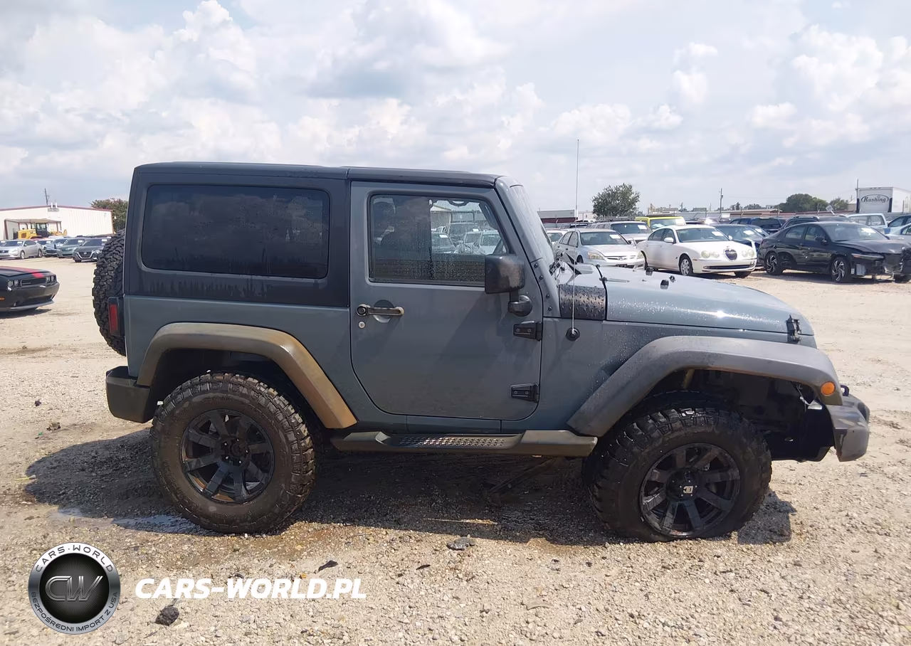 2014 Jeep Wrangler Willys Wheeler VIN:1C4AJWAG3EL253917 - 13