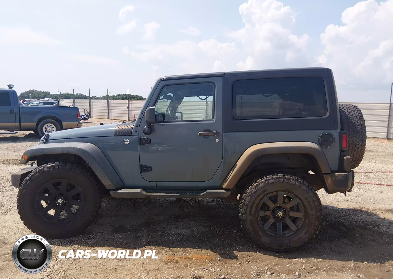 2014 Jeep Wrangler Willys Wheeler VIN:1C4AJWAG3EL253917 - 14
