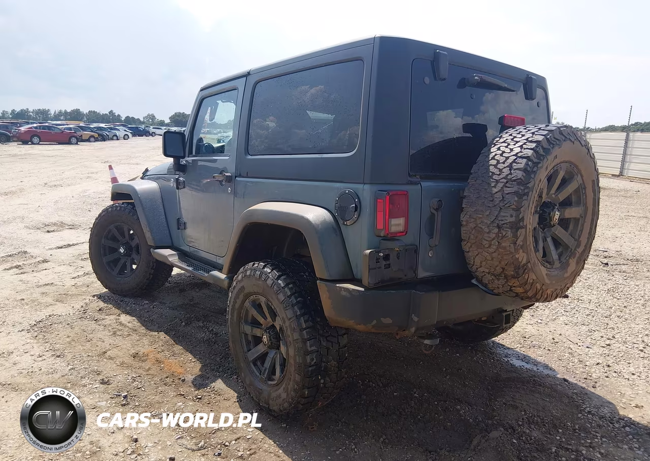 2014 Jeep Wrangler Willys Wheeler VIN:1C4AJWAG3EL253917 - 3