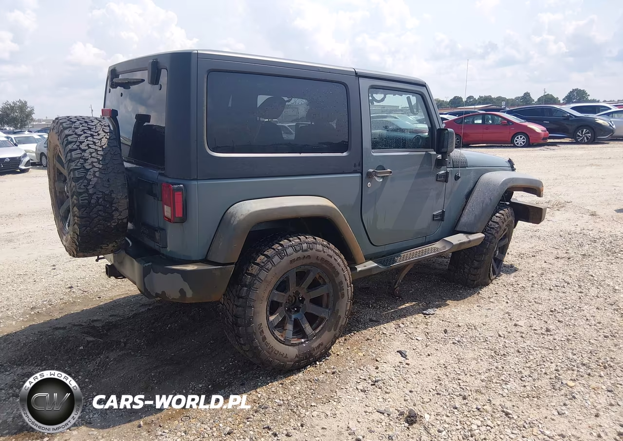 2014 Jeep Wrangler Willys Wheeler VIN:1C4AJWAG3EL253917 - 4