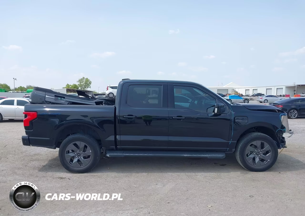 2023 Ford F-150 Lightning Lariat VIN:1FTVW1EL9PWG20219 - 14