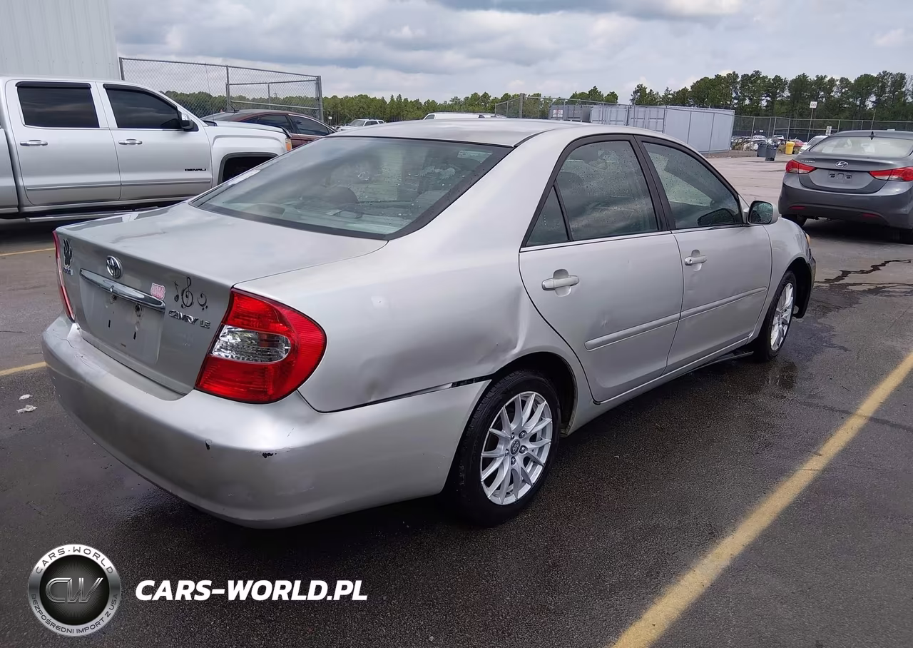 2002 Toyota Camry Le VIN:4T1BE32K22U071900 - 4