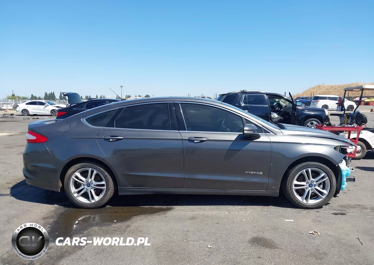 2016 Ford Fusion Hybrid Titanium VIN:3FA6P0RU3GR144735 - 14