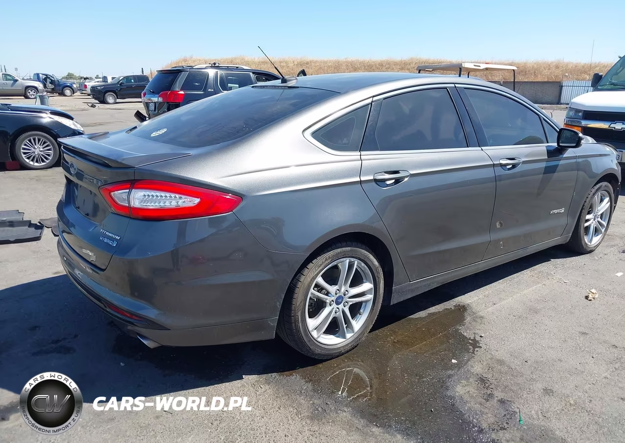 2016 Ford Fusion Hybrid Titanium VIN:3FA6P0RU3GR144735 - 4