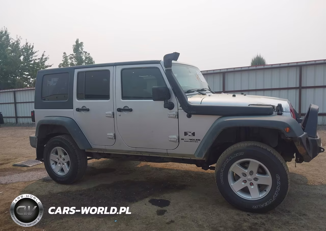 2009 Jeep Wrangler Unlimited X VIN:1J4GA39119L751932 - 13