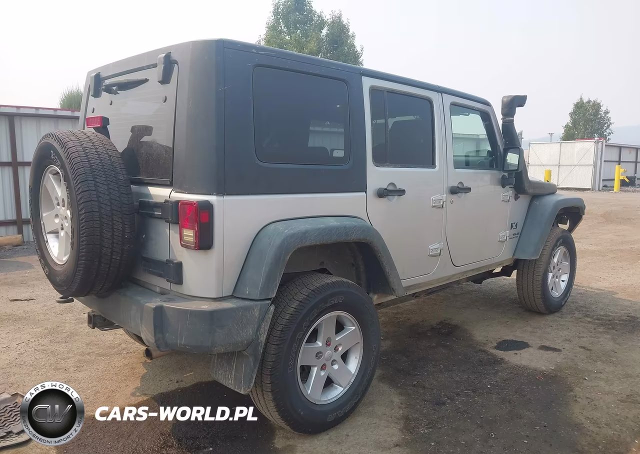 2009 Jeep Wrangler Unlimited X VIN:1J4GA39119L751932 - 4