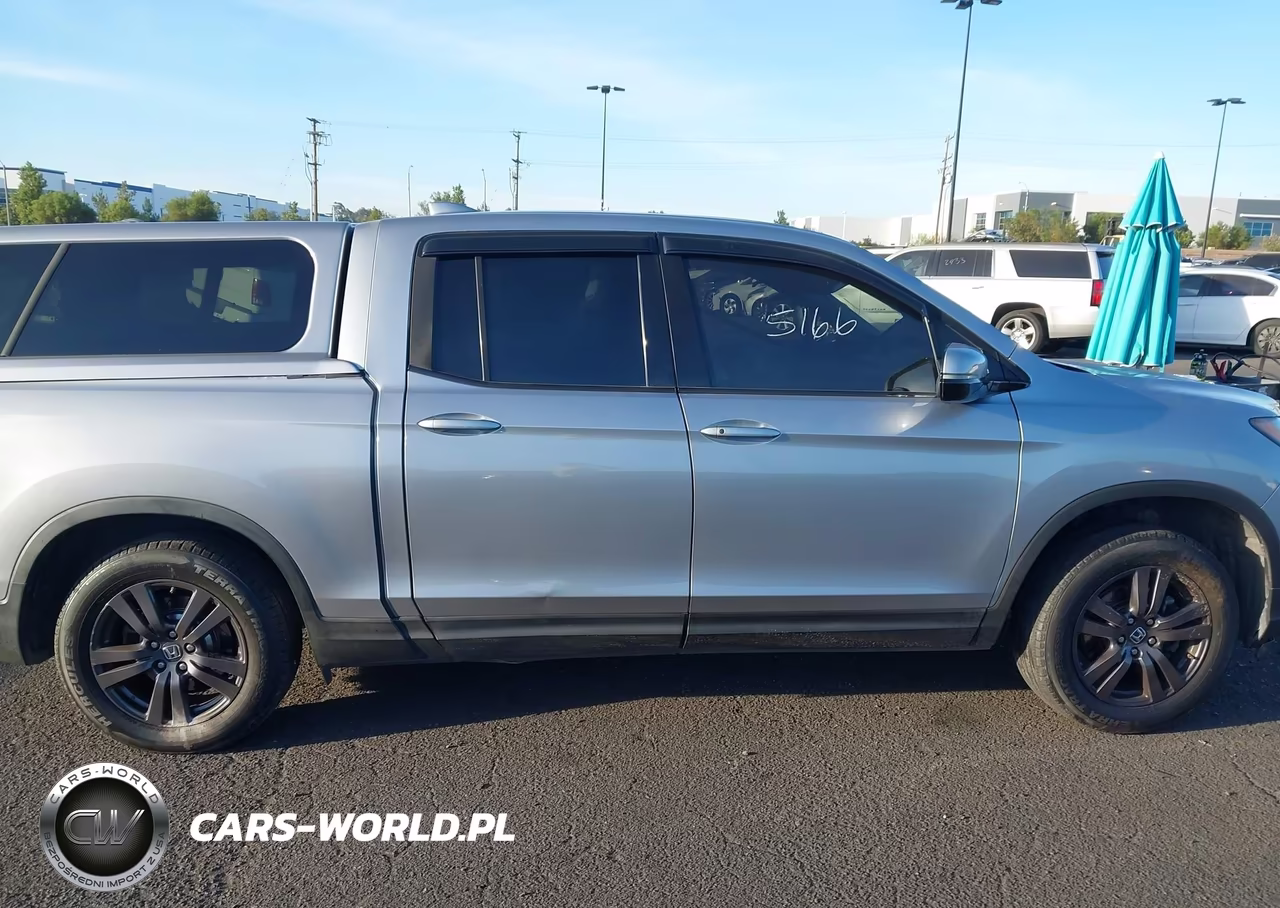 2018 Honda Ridgeline Sport VIN:5FPYK3F15JB000715 - 14