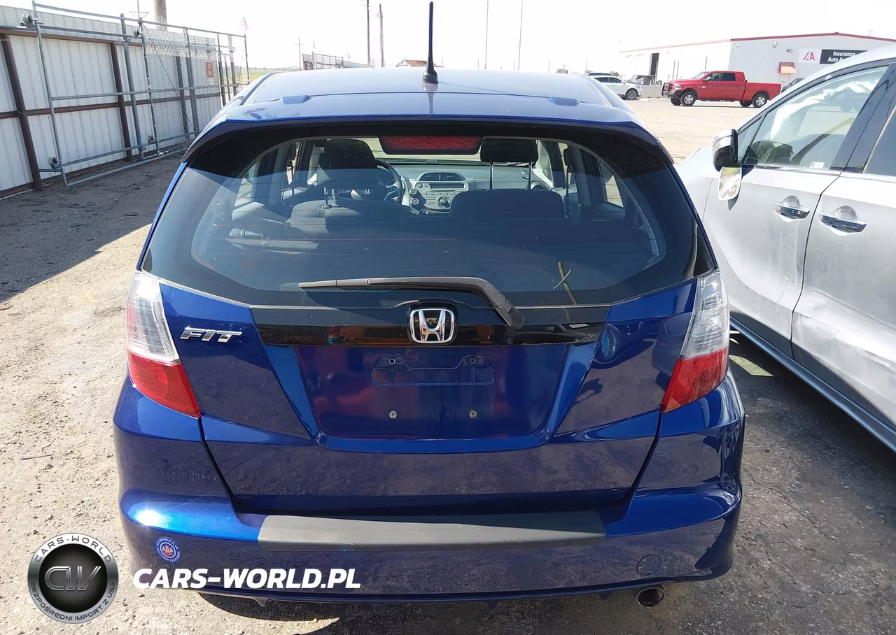 2009 Honda Fit Sport VIN:JHMGE88459S014661 - 16