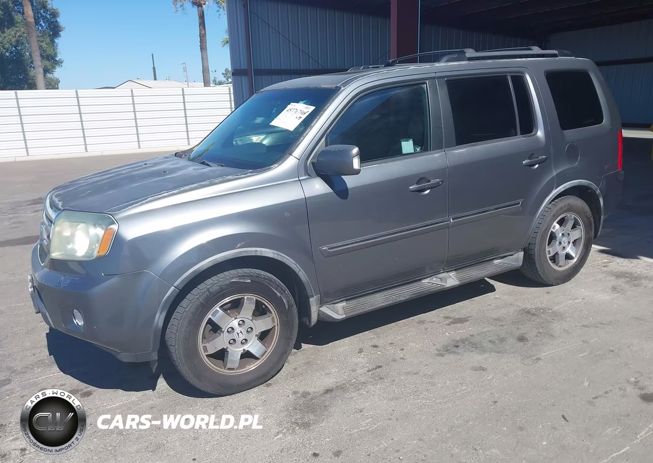 2011 Honda Pilot Touring VIN:5FNYF3H99BB015123 - 2