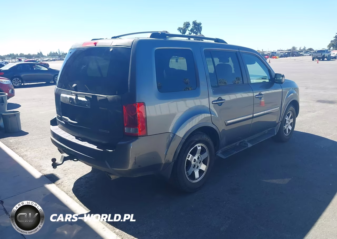 2011 Honda Pilot Touring VIN:5FNYF3H99BB015123 - 4