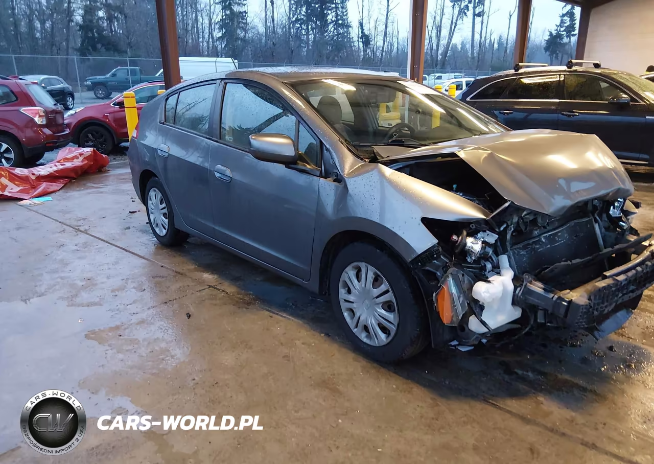 2011 Honda Insight VIN:JHMZE2H32BS001076 - 1