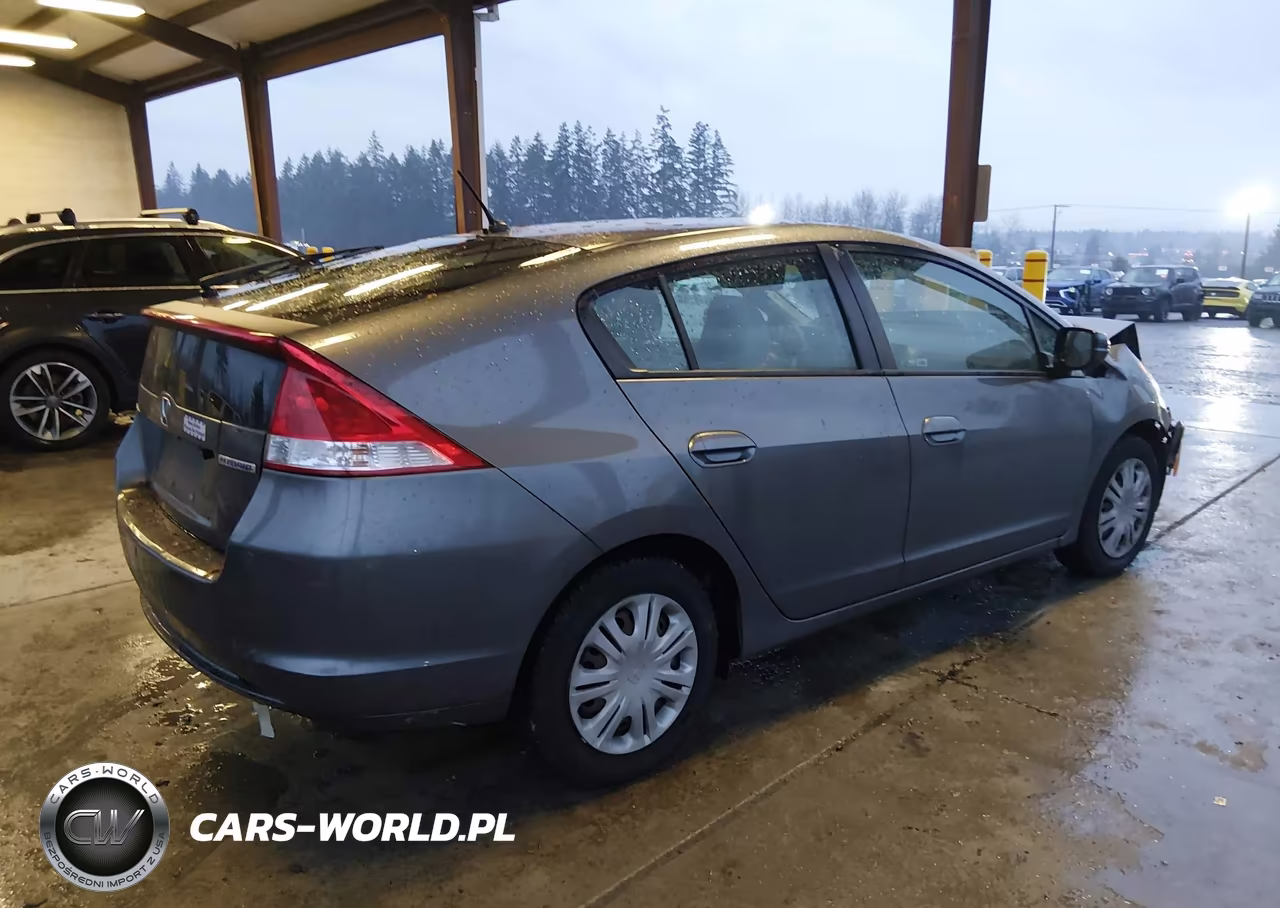 2011 Honda Insight VIN:JHMZE2H32BS001076 - 4