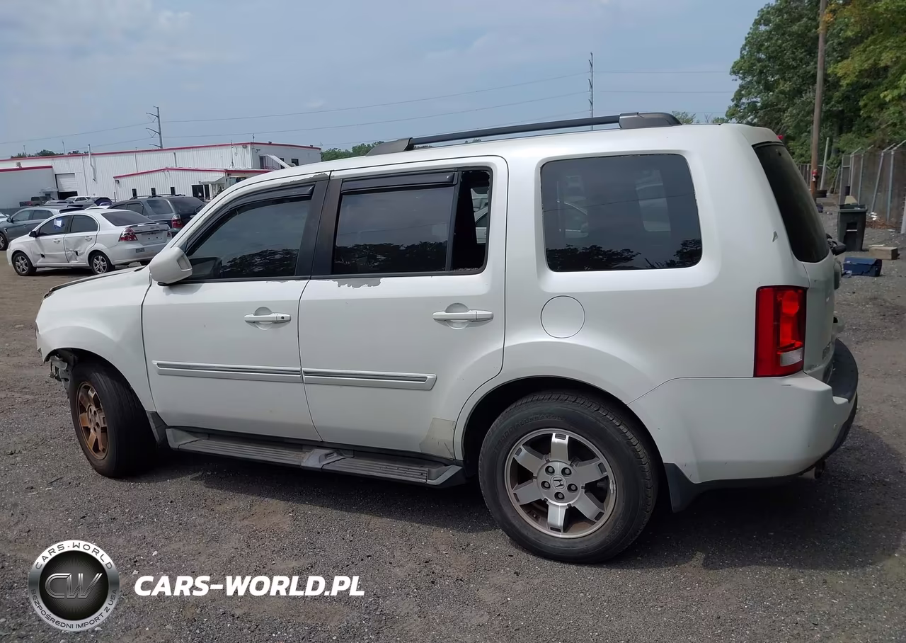 2011 Honda Pilot Touring VIN:5FNYF3H91BB021207 - 13