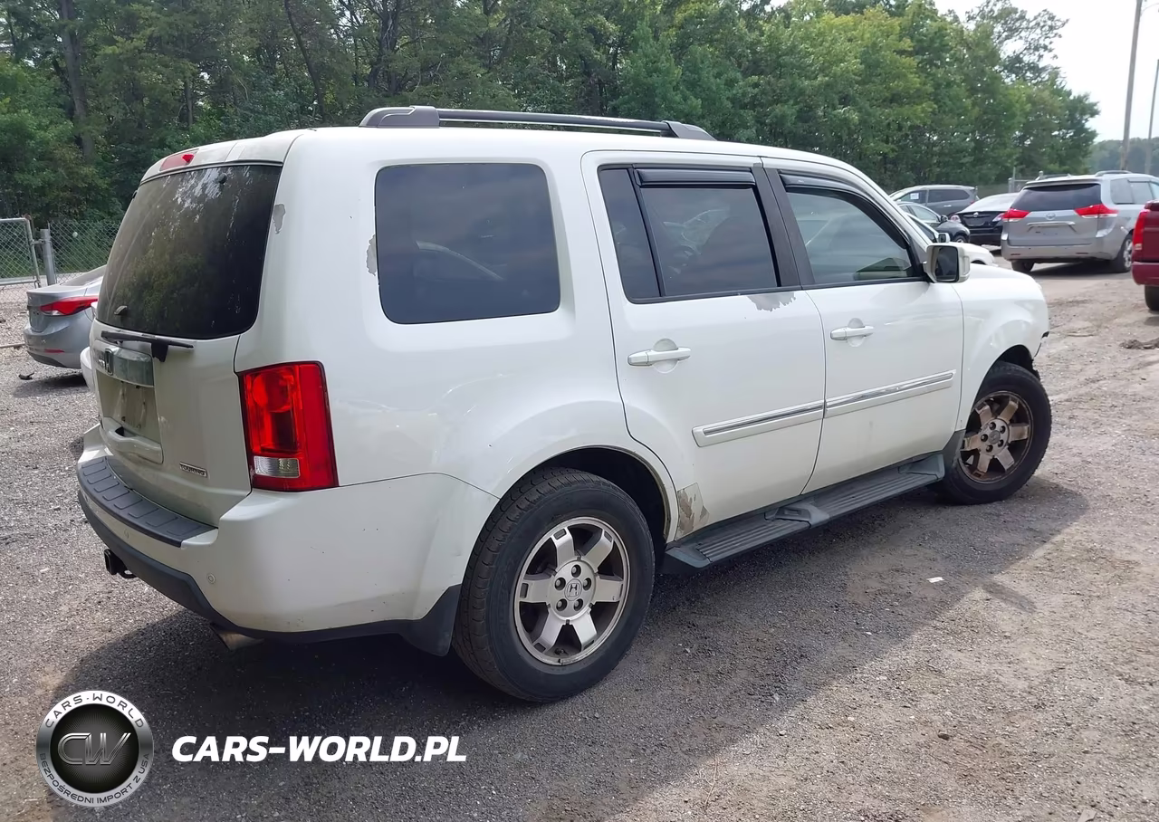 2011 Honda Pilot Touring VIN:5FNYF3H91BB021207 - 4