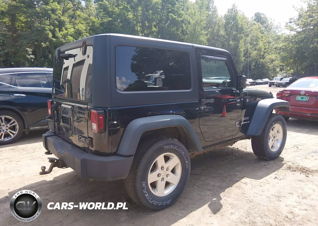 2012 Jeep Wrangler Sport VIN:1C4AJWAG5CL256184 - 4