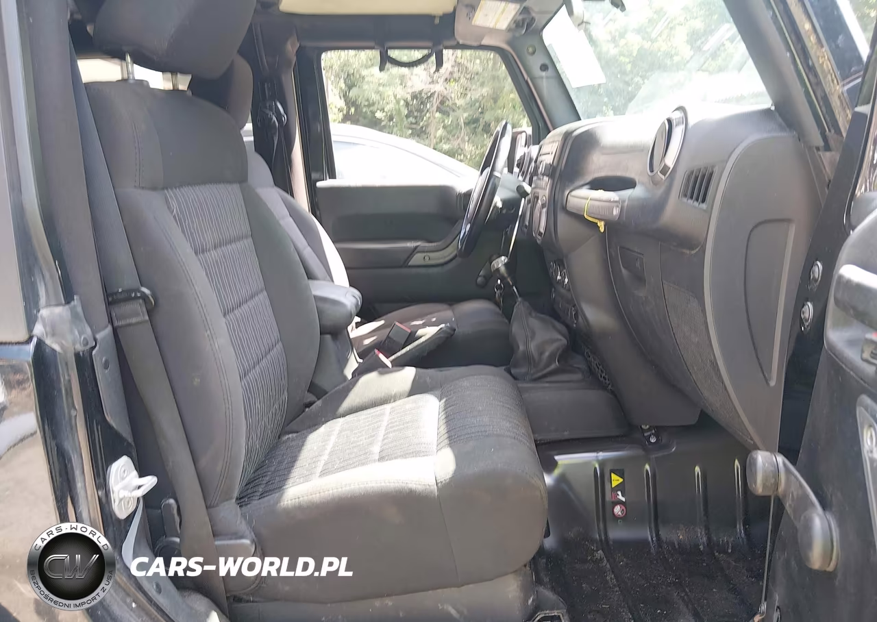 2012 Jeep Wrangler Sport VIN:1C4AJWAG5CL256184 - 5