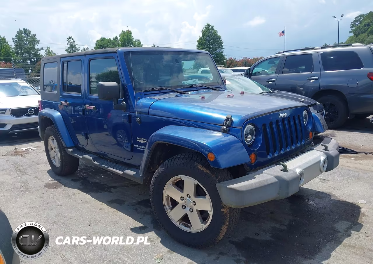 2009 Jeep Wrangler Unlimited Sahara VIN:1J4GA59139L765388 - 13