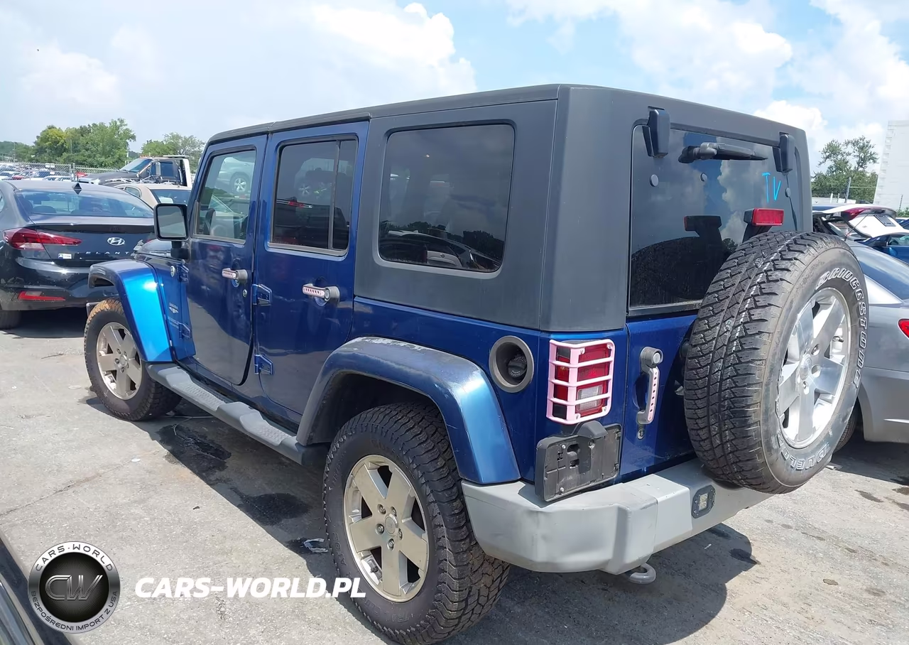 2009 Jeep Wrangler Unlimited Sahara VIN:1J4GA59139L765388 - 14