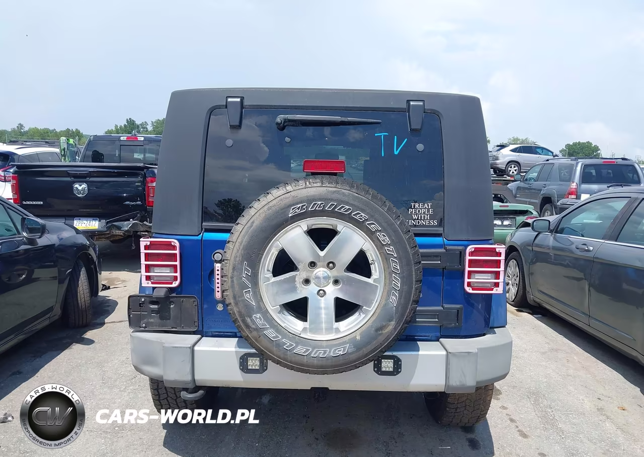 2009 Jeep Wrangler Unlimited Sahara VIN:1J4GA59139L765388 - 16