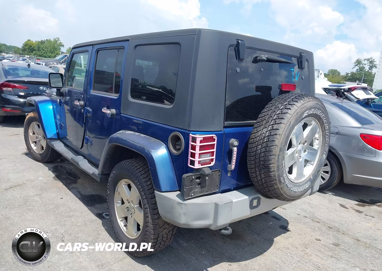 2009 Jeep Wrangler Unlimited Sahara VIN:1J4GA59139L765388 - 3