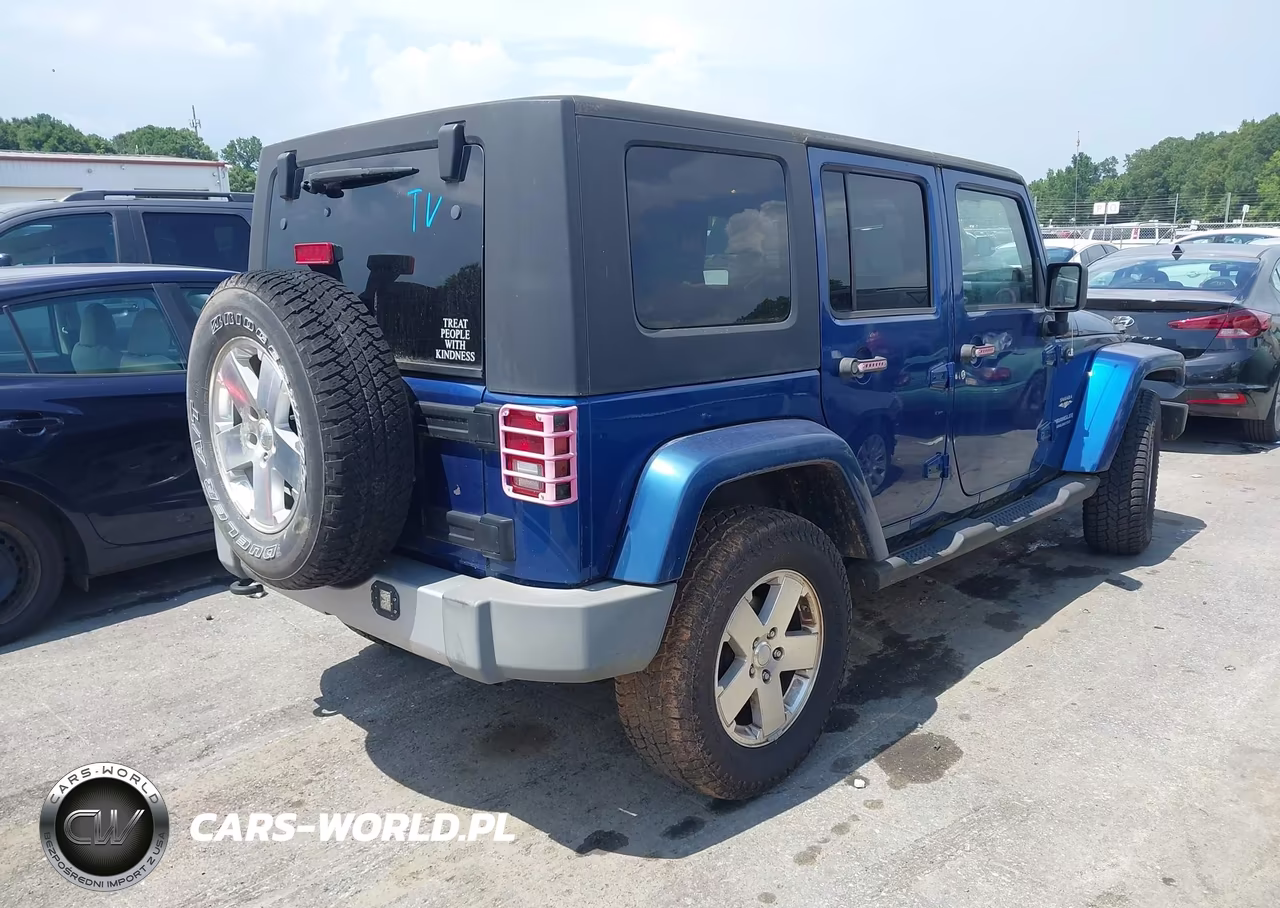 2009 Jeep Wrangler Unlimited Sahara VIN:1J4GA59139L765388 - 4