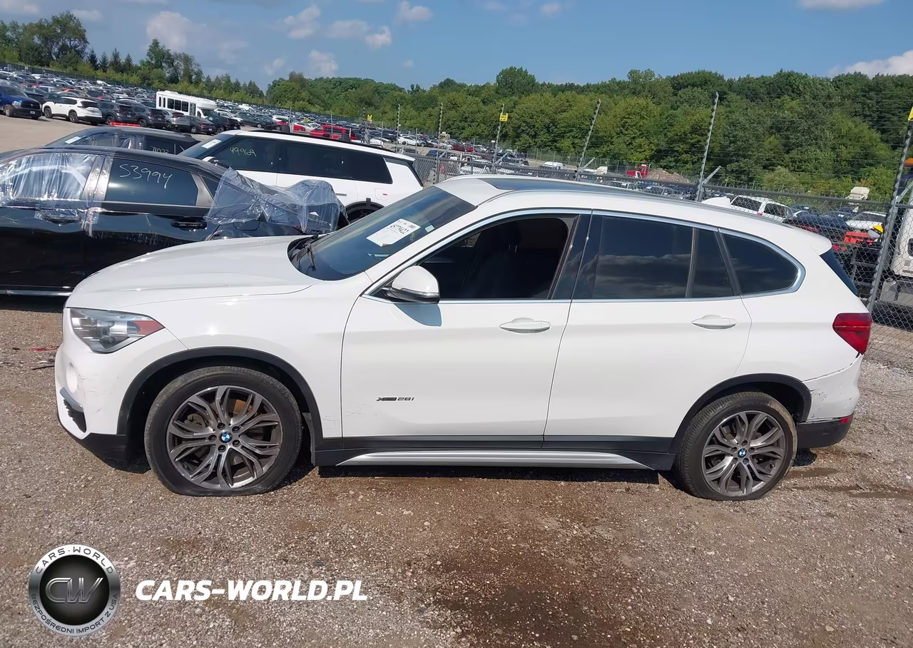 2018 BMW X1 xDrive28I VIN:WBXHT3C38J5K21242 - 14