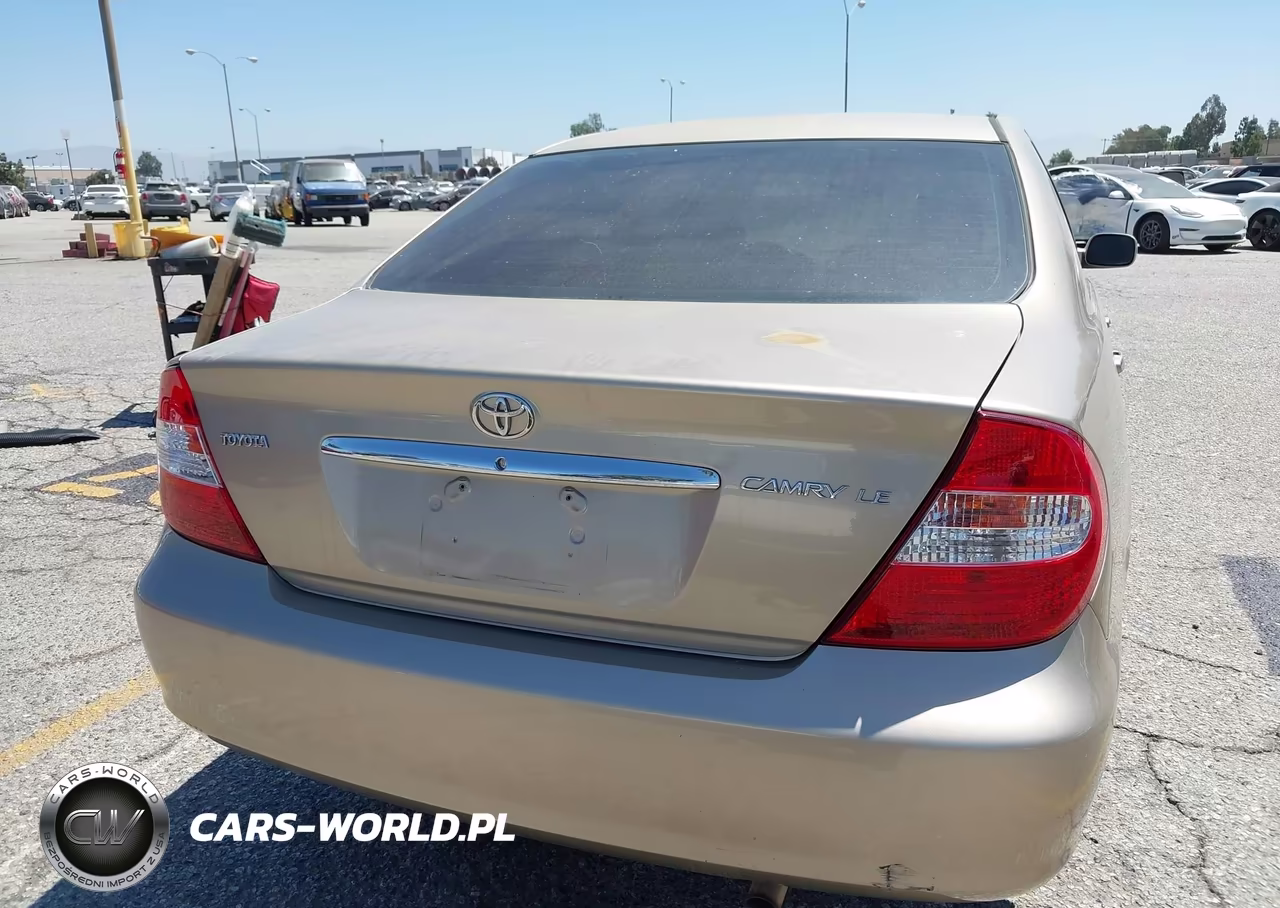 2002 Toyota Camry Le VIN:JTDBE32K020041306 - 6