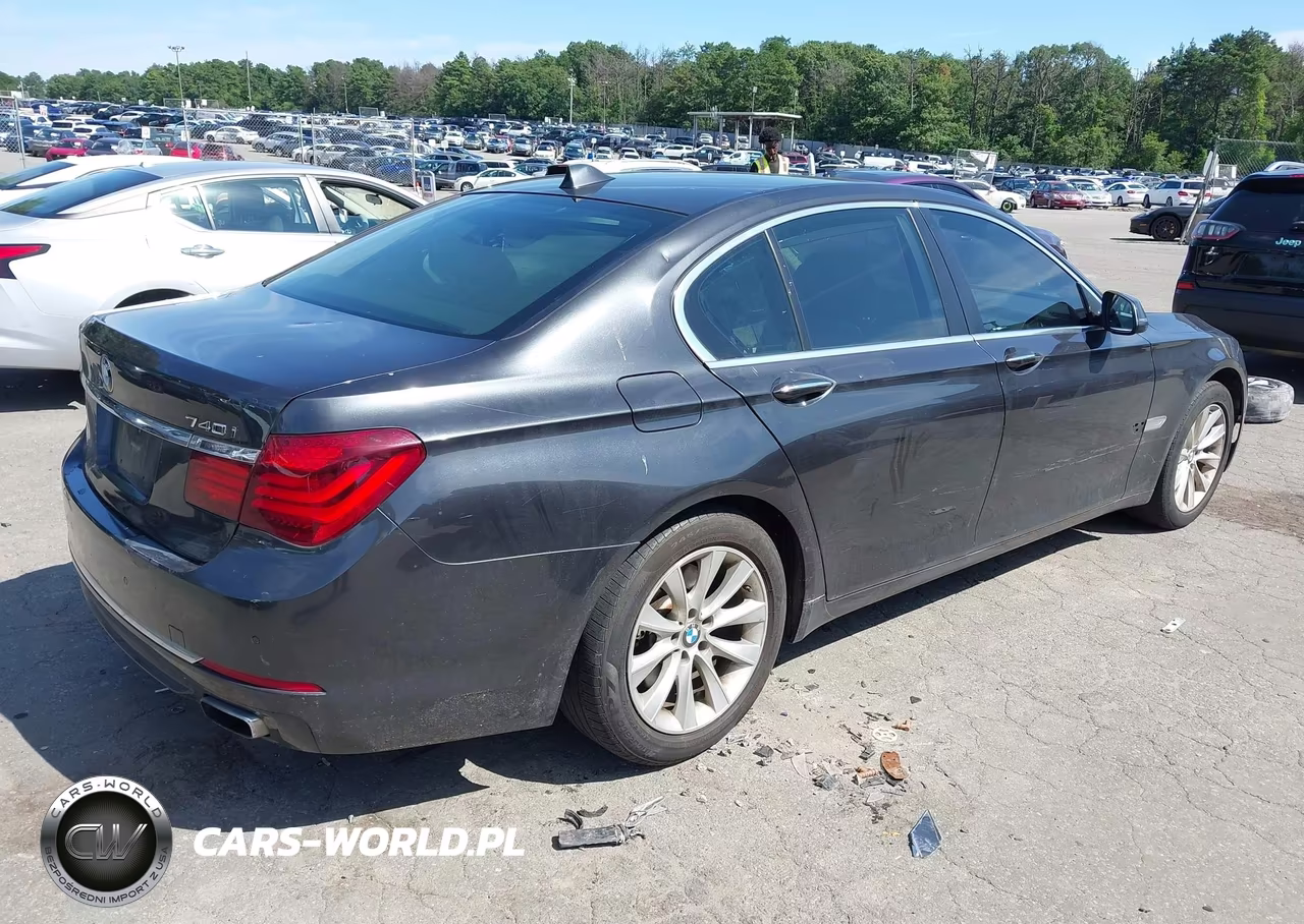 2015 BMW 740I VIN:WBAYA6C55FGK16479 - 4