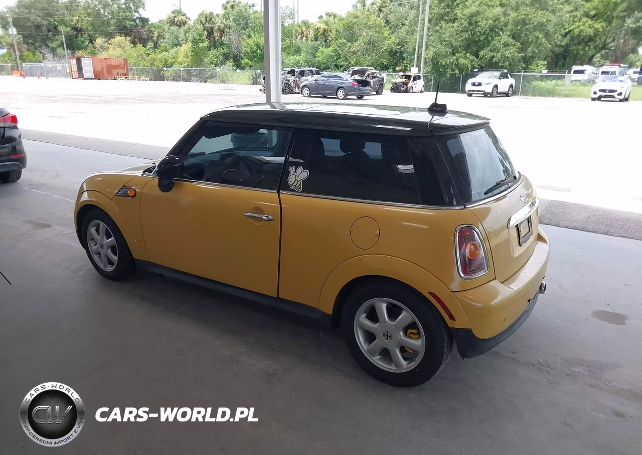 2009 Mini Cooper VIN:WMWMF33539TW73673 - 3
