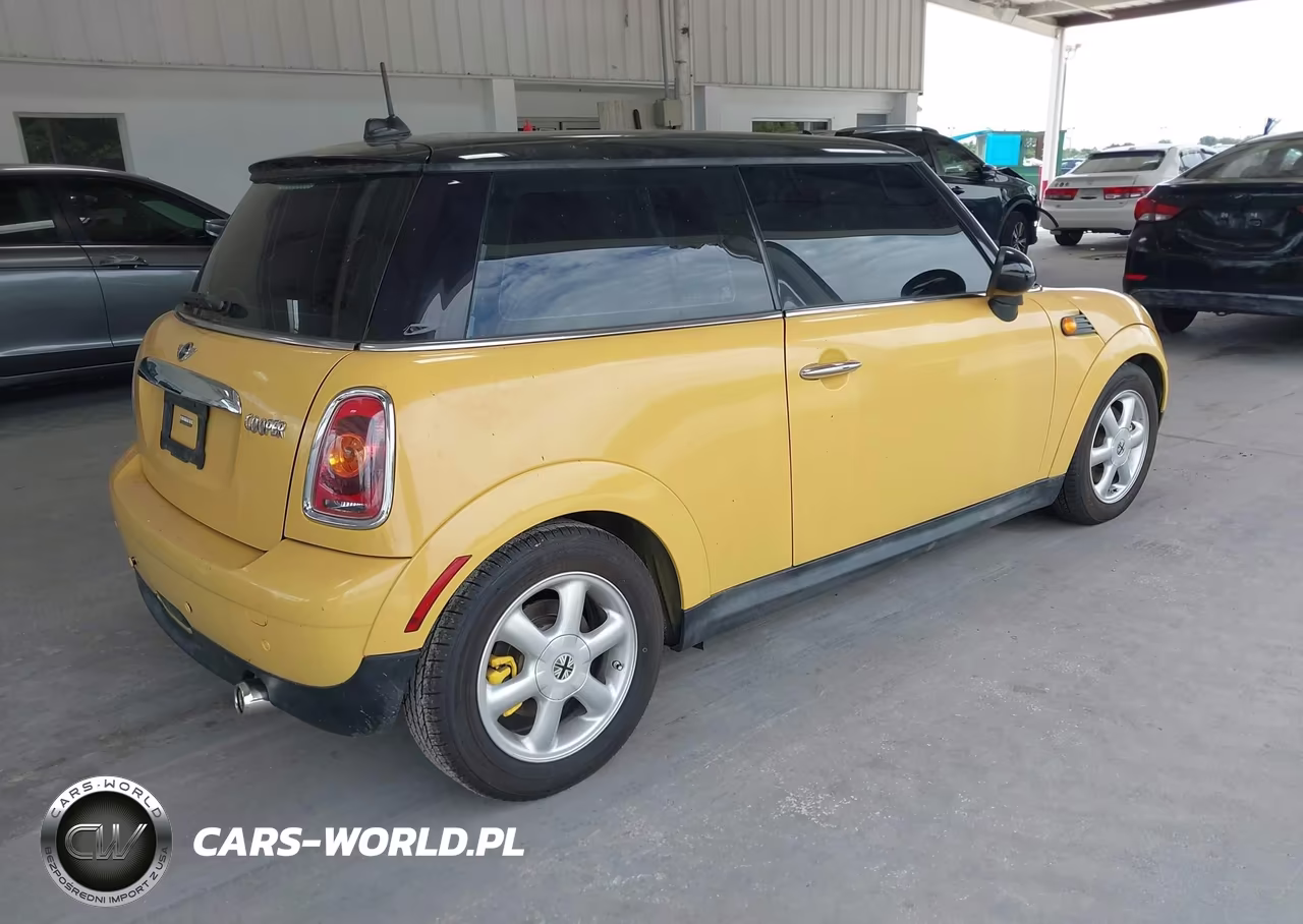 2009 Mini Cooper VIN:WMWMF33539TW73673 - 4