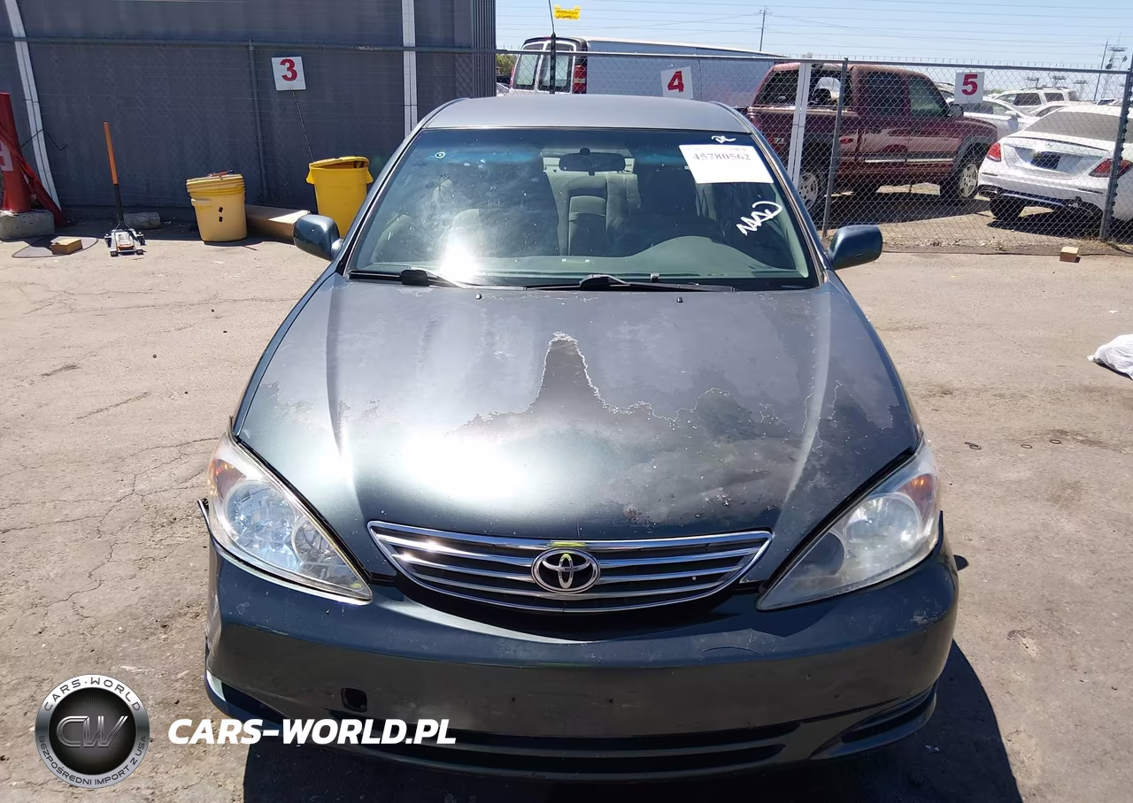 2002 Toyota Camry Le VIN:JTDBE32K820017285 - 11
