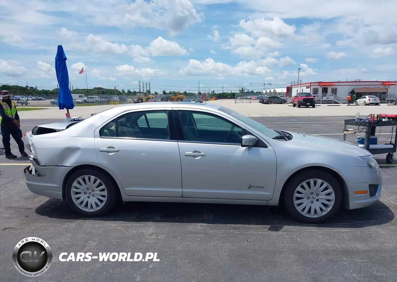 2012 Ford Fusion Hybrid VIN:3FADP0L36CR245821 - 13