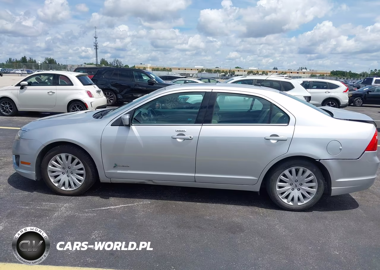 2012 Ford Fusion Hybrid VIN:3FADP0L36CR245821 - 14